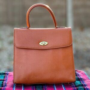 Vintage Coach turnlock top handle bag